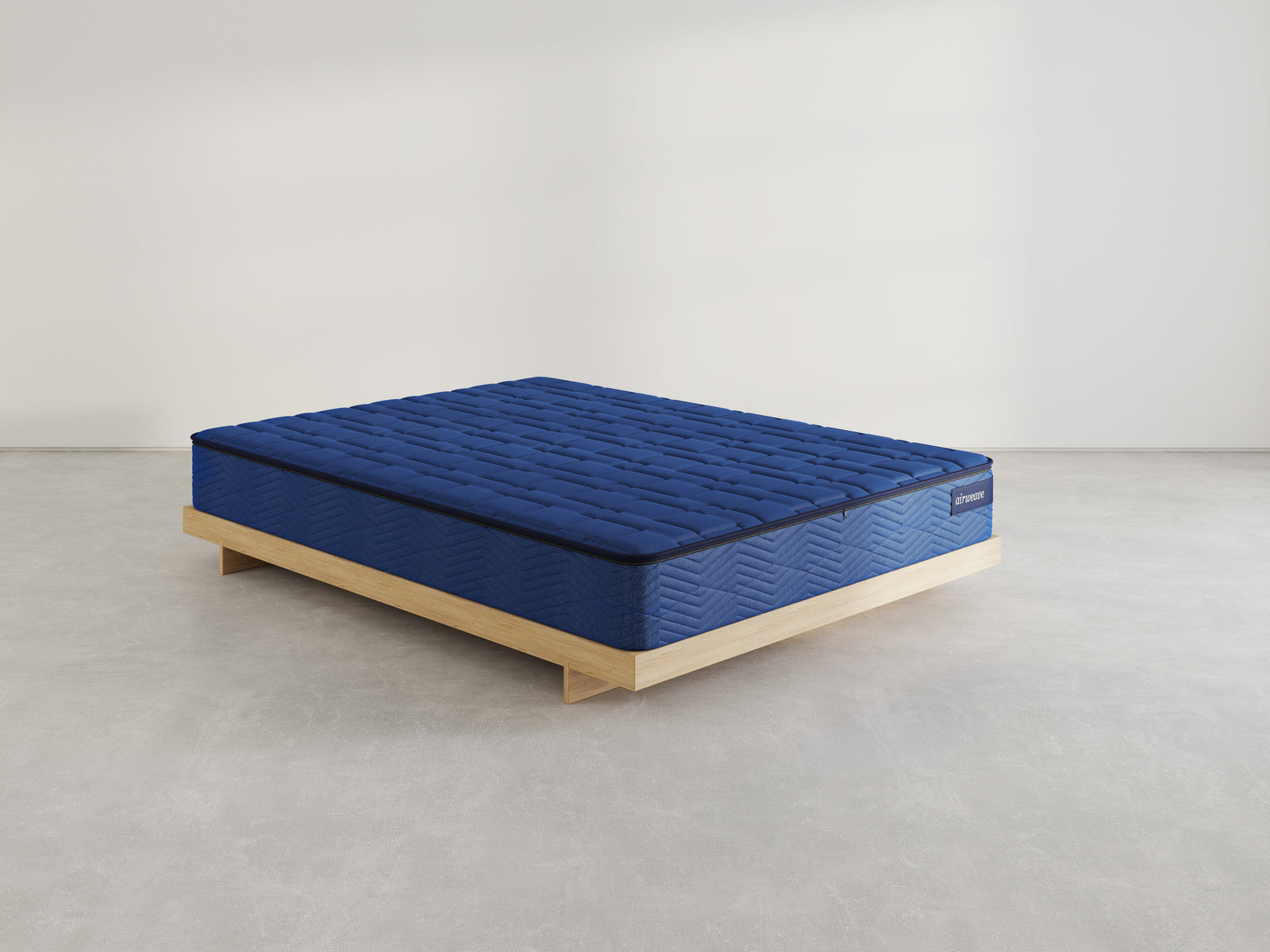 Airweave mattress on a wooden bed frame, studio product photo