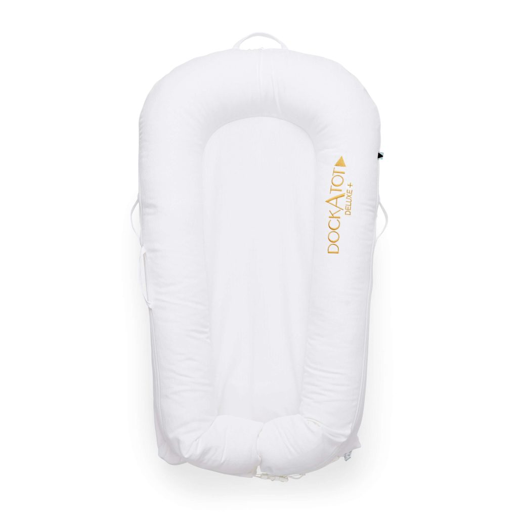 Current official DockATot Deluxe+ Dock product photography, Pristine White colorway