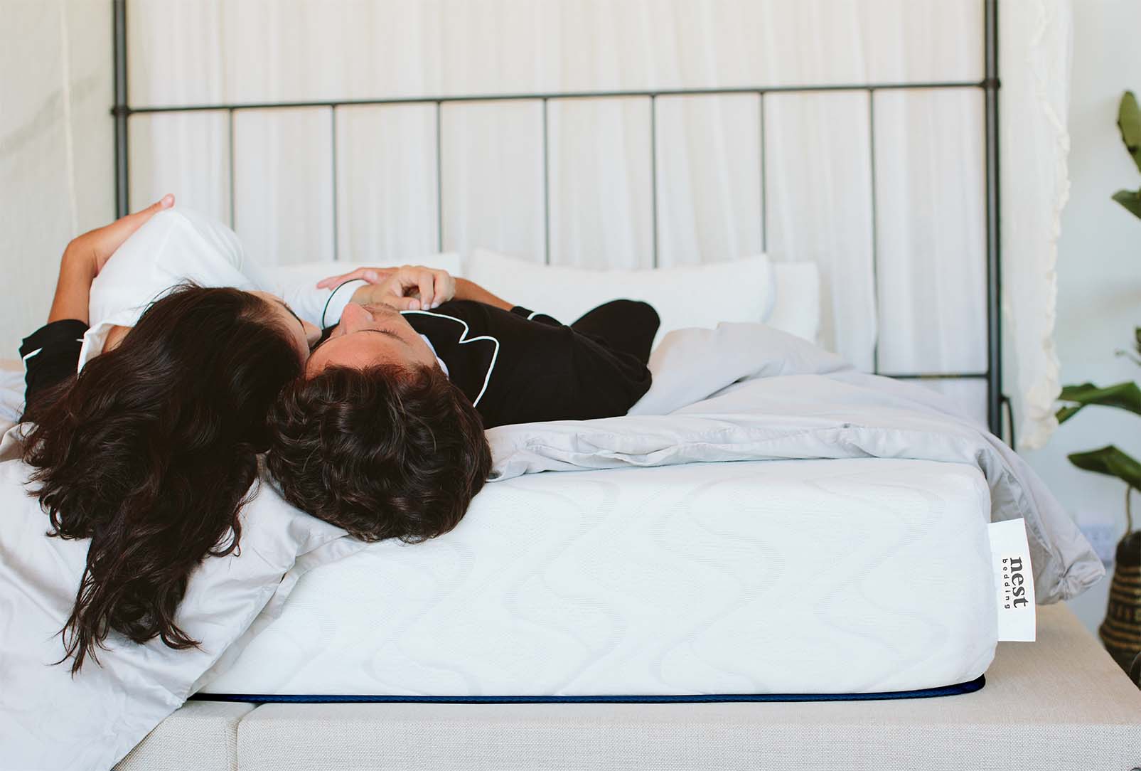 Current official Nest Bedding Quail (formerly Love & Sleep) mattress lifestyle product photography