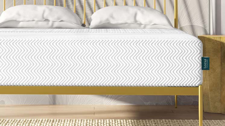 Leesa Legend mattress on a gold bed frame, current product photography