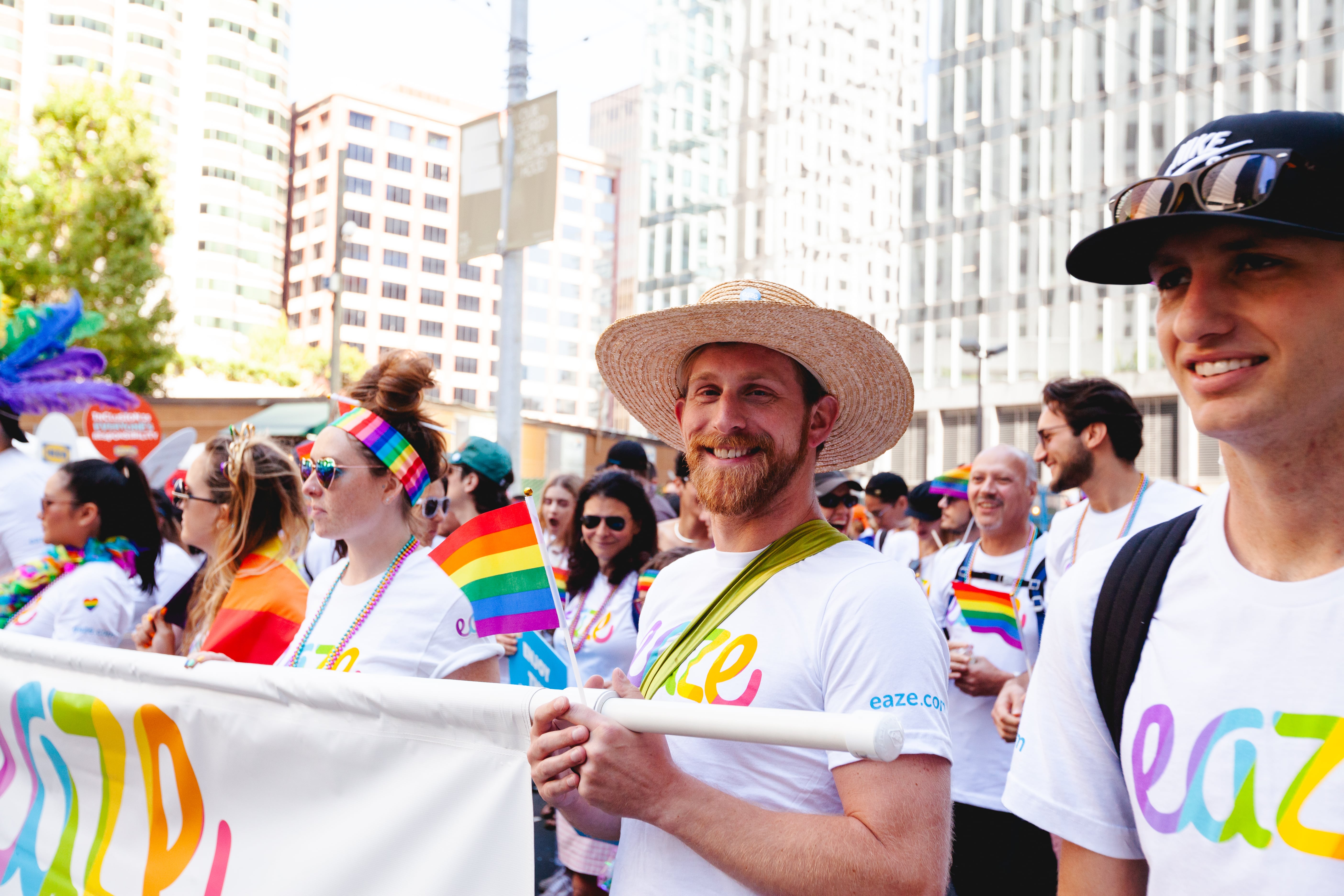 Eaze team marching in the SF Pride parade wearing Eaze-branded shirts, from the Eaze website