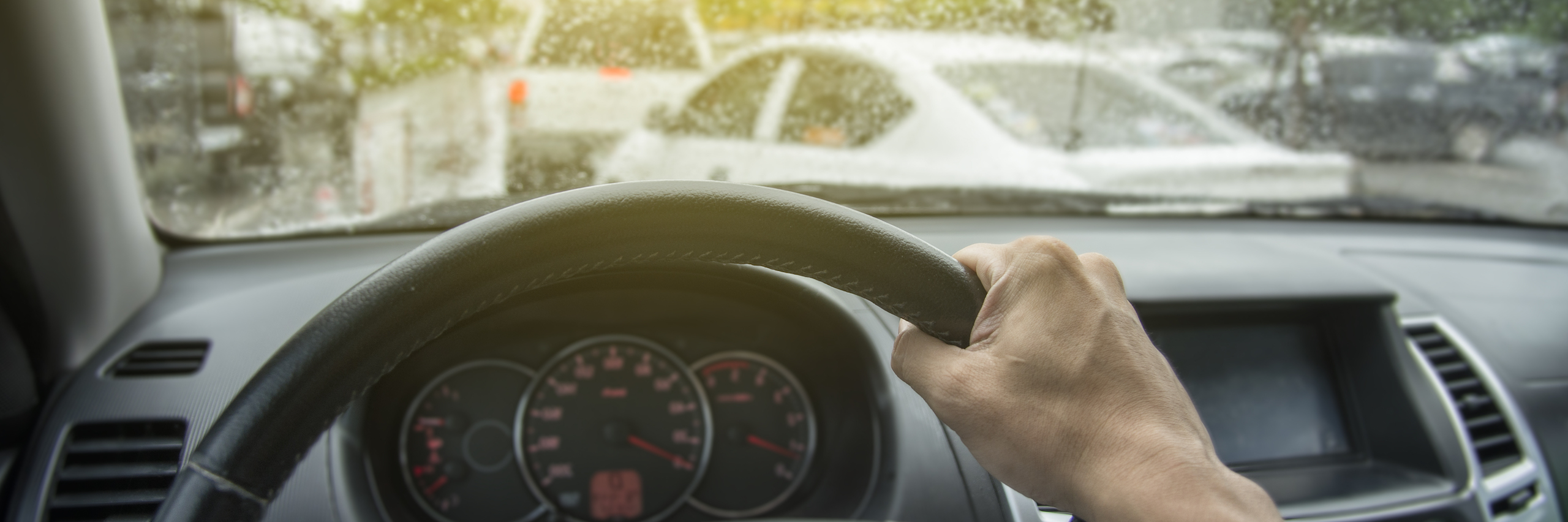 Driving photo illustrating on-demand delivery, from the Eaze website