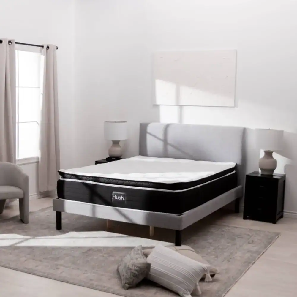 Gotta Sleep Hush mattress on a bed frame, product photography from the Gotta Sleep website
