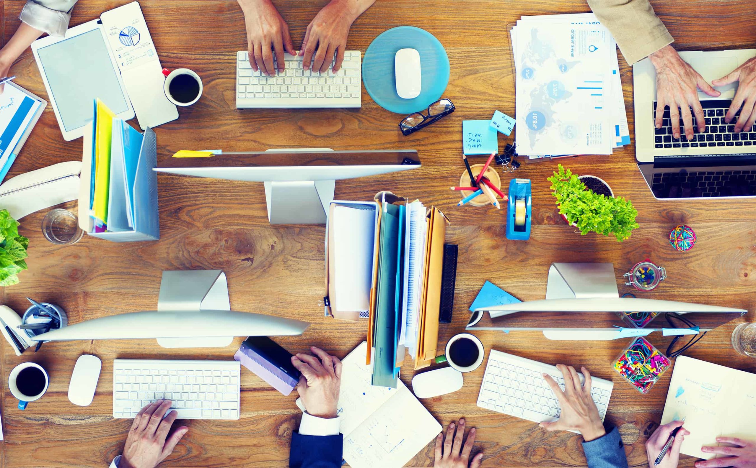 LendKey official media-kit press photo of a team working at desks, from the LendKey website