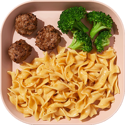 Nurture Life Swedish meatballs meal tray with egg noodles and broccoli, from the Nurture Life website